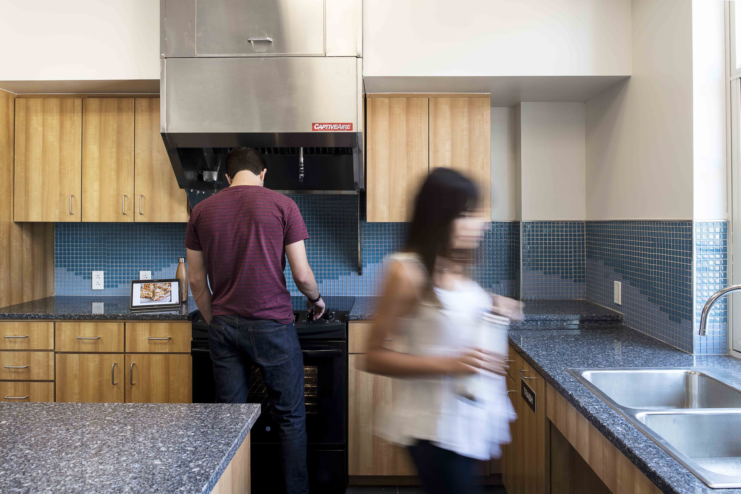 People using the kitchen at OSU housing