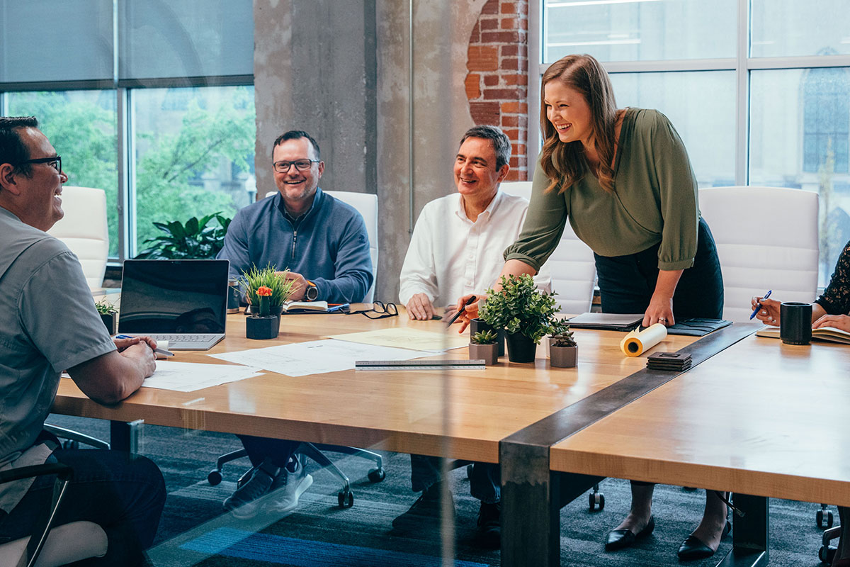 People talking around a meeting table